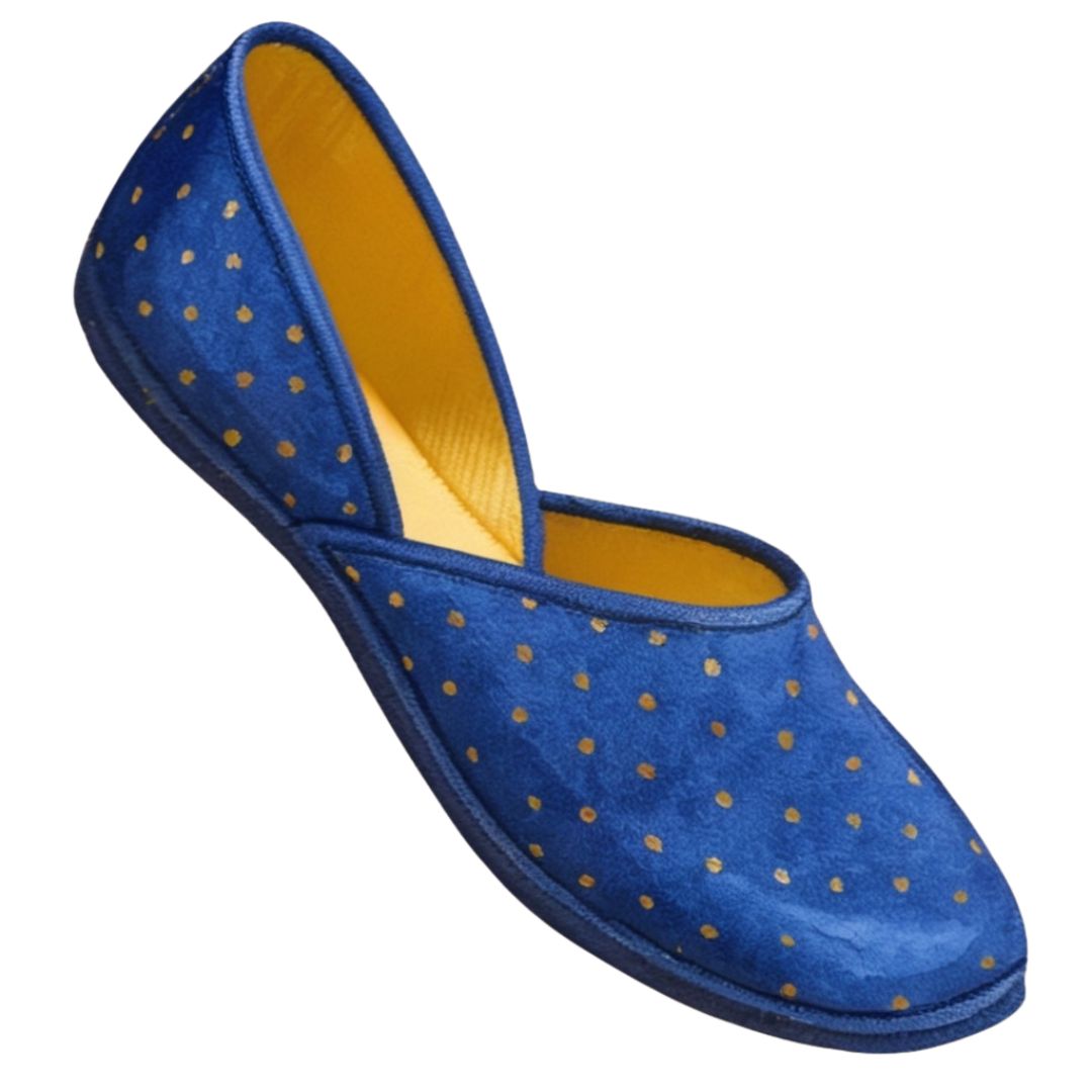 Blue shoe with gold polka dots on a white background