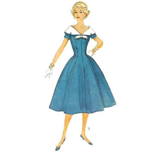 Model wearing 1950s dress with detachable collar and bow made from Simplicity 2496 pattern