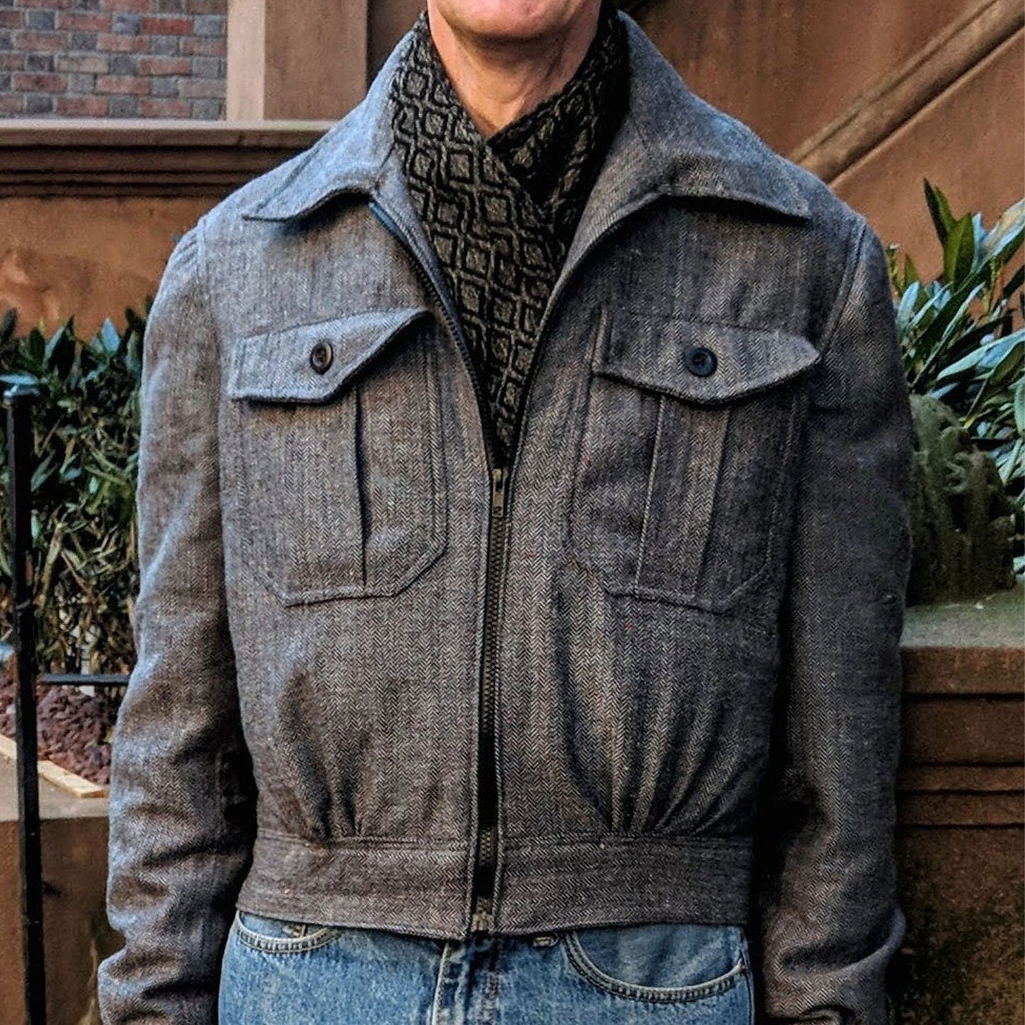 MAN WEARING A BOMBER JACKET MADE UP FROM SEWING PATTERN 