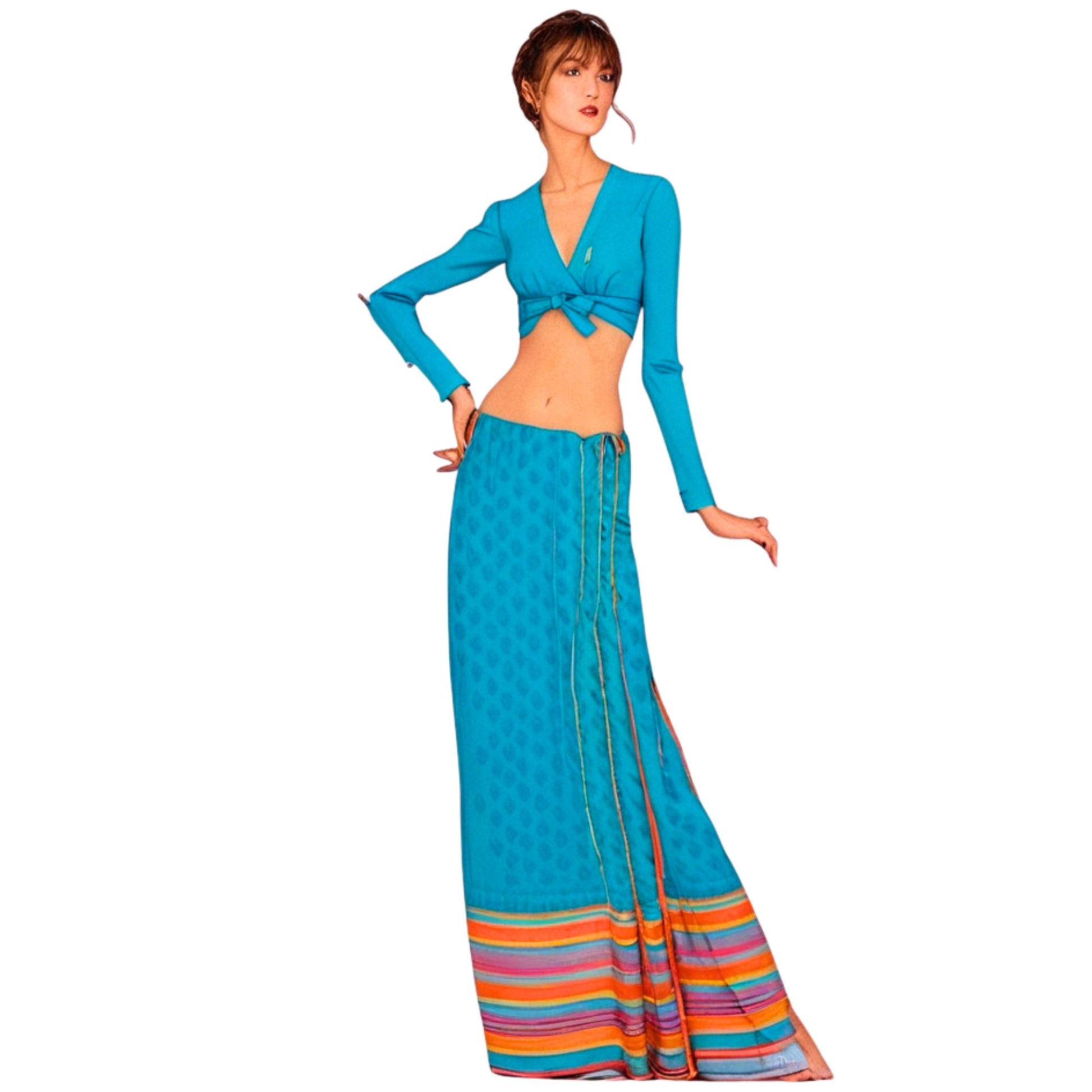 Woman wearing a blue outfit with a colorful skirt on a white background