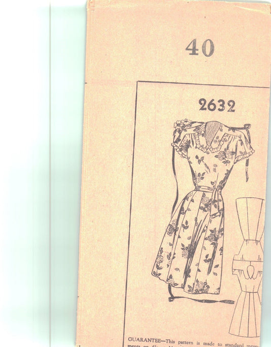 Model wearing dress made from Weldon’s 2632 pattern