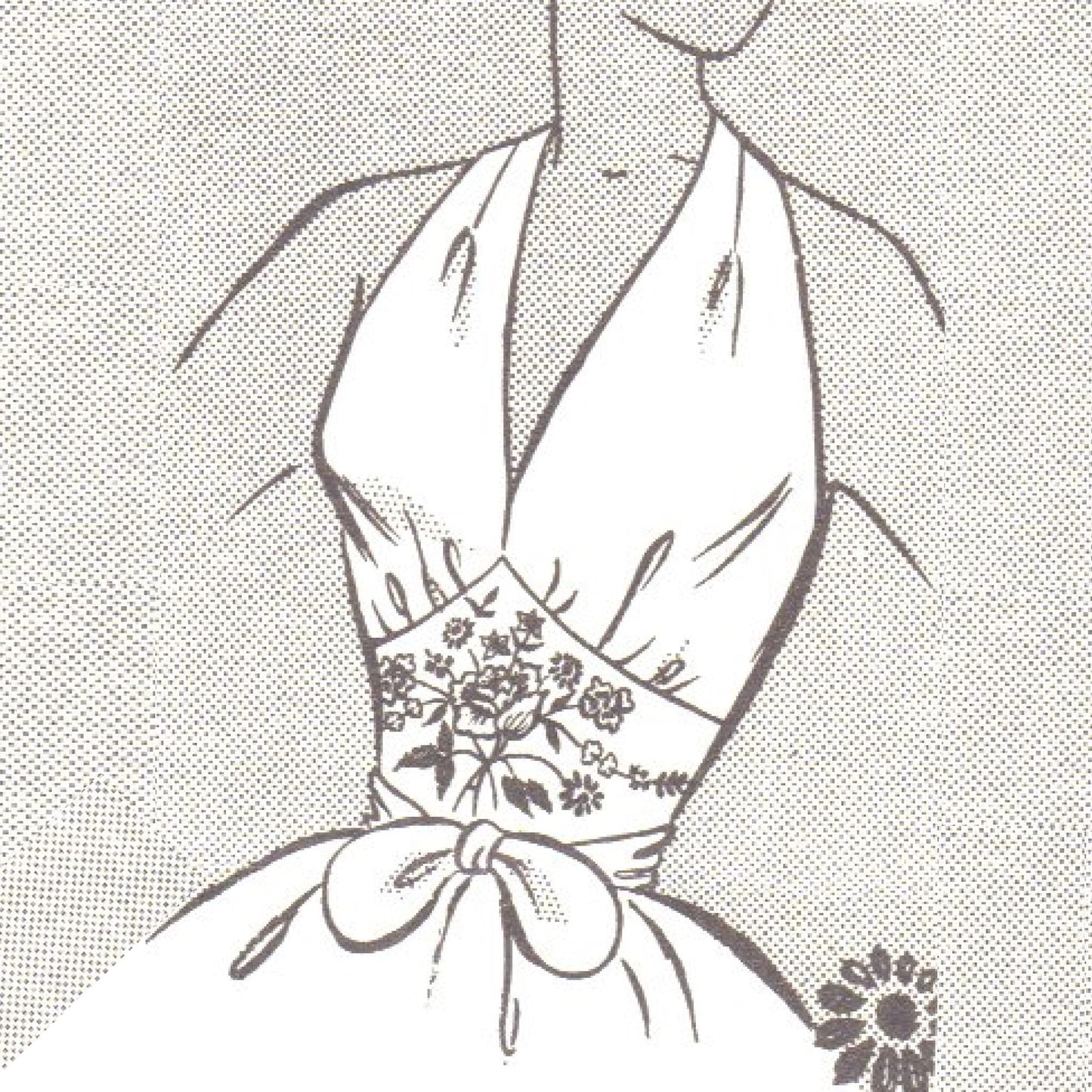 Model wearing jiffy wrap halter blouse made from Weldon’s 572 pattern