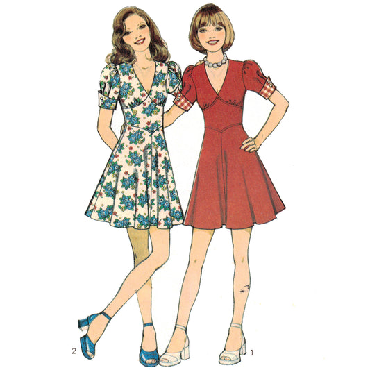 Two women wearing vintage dresses on a white background