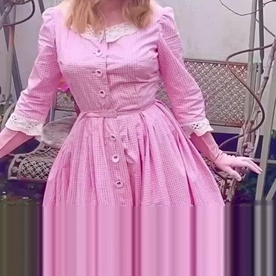 Video of lady in pink gingham Bridgitte Bardor Dress