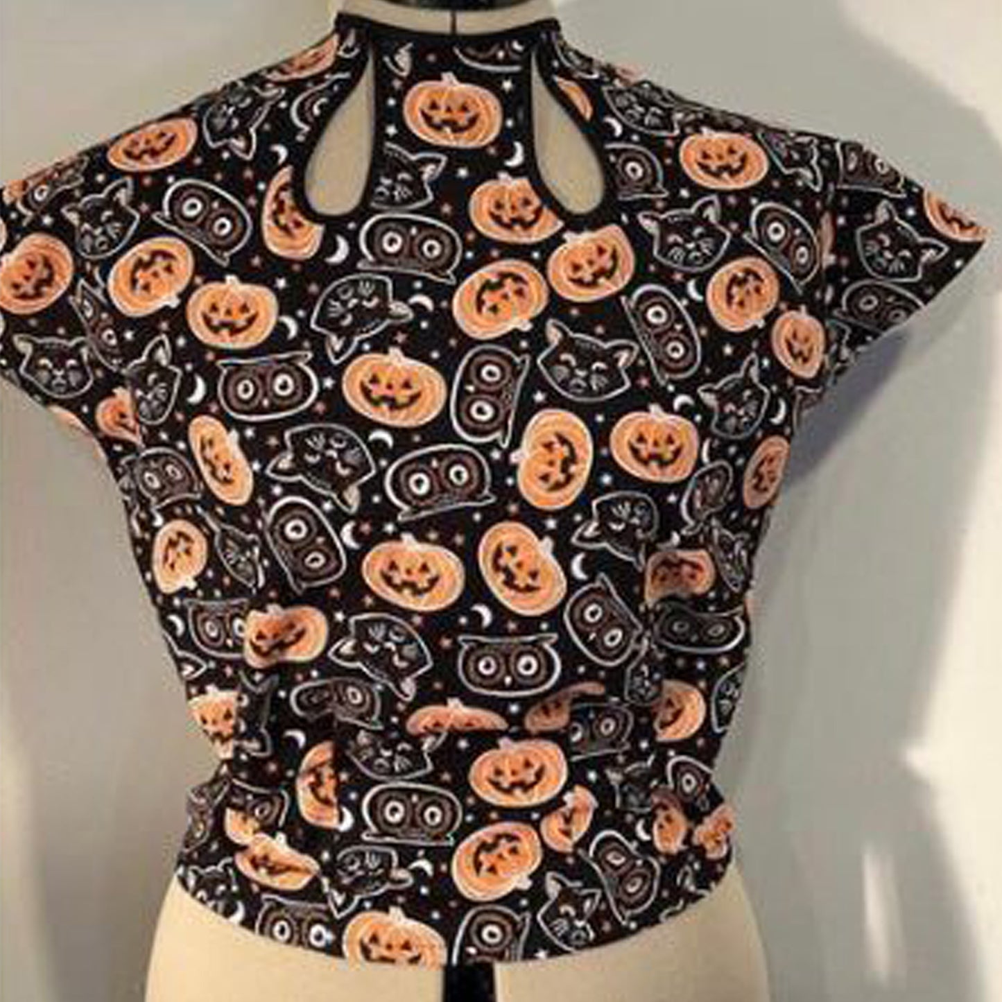 Blouse with petal neckline made from a variation of this pattern