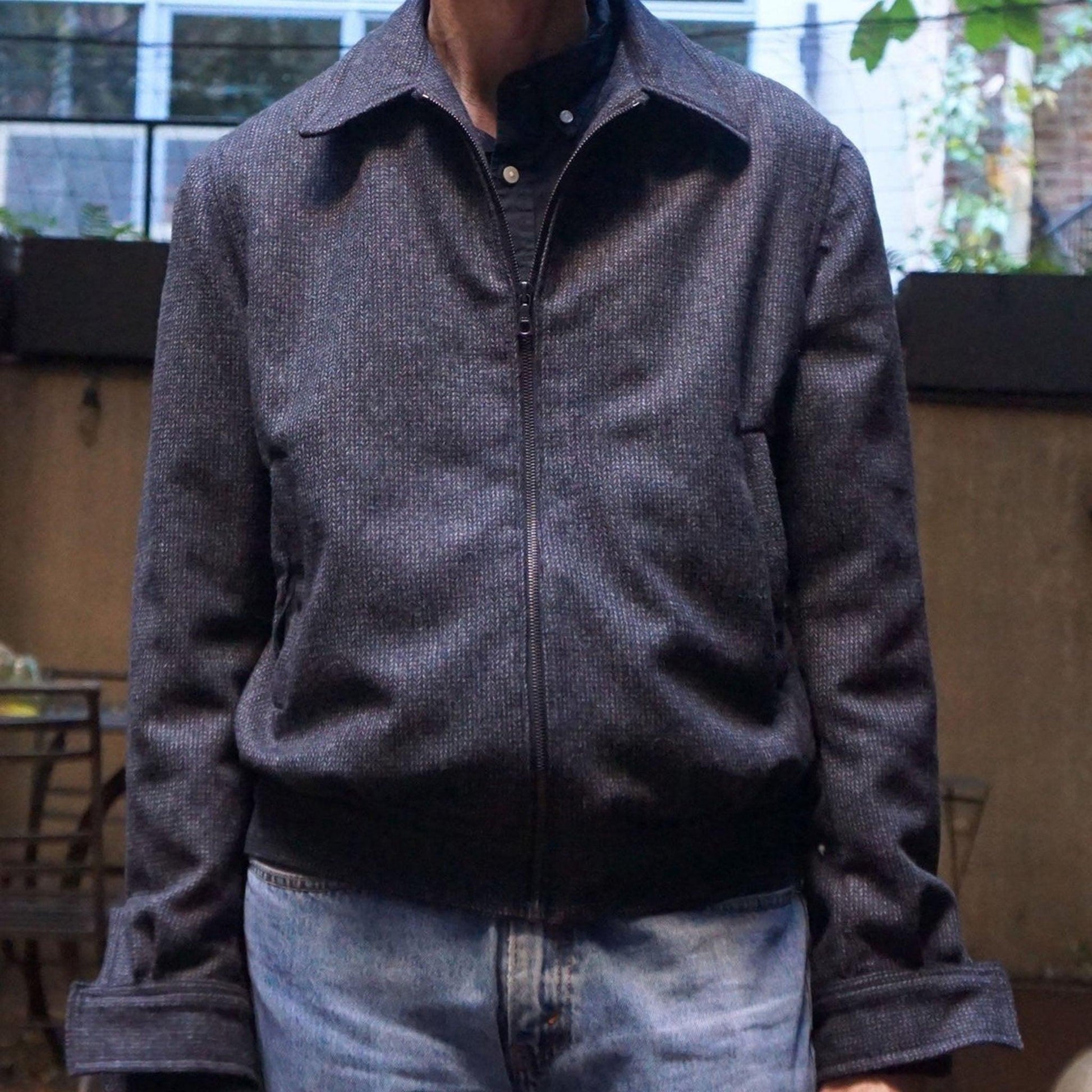 Man wearing a bomber jacket.