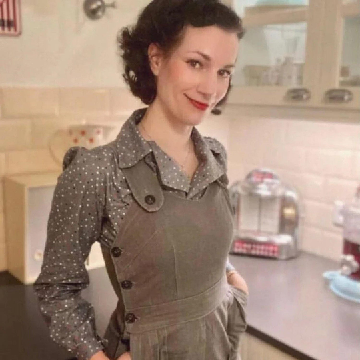 Photograph of women wearing 'Rosie Overalls' in grey, with a matching grey shirt underneath.