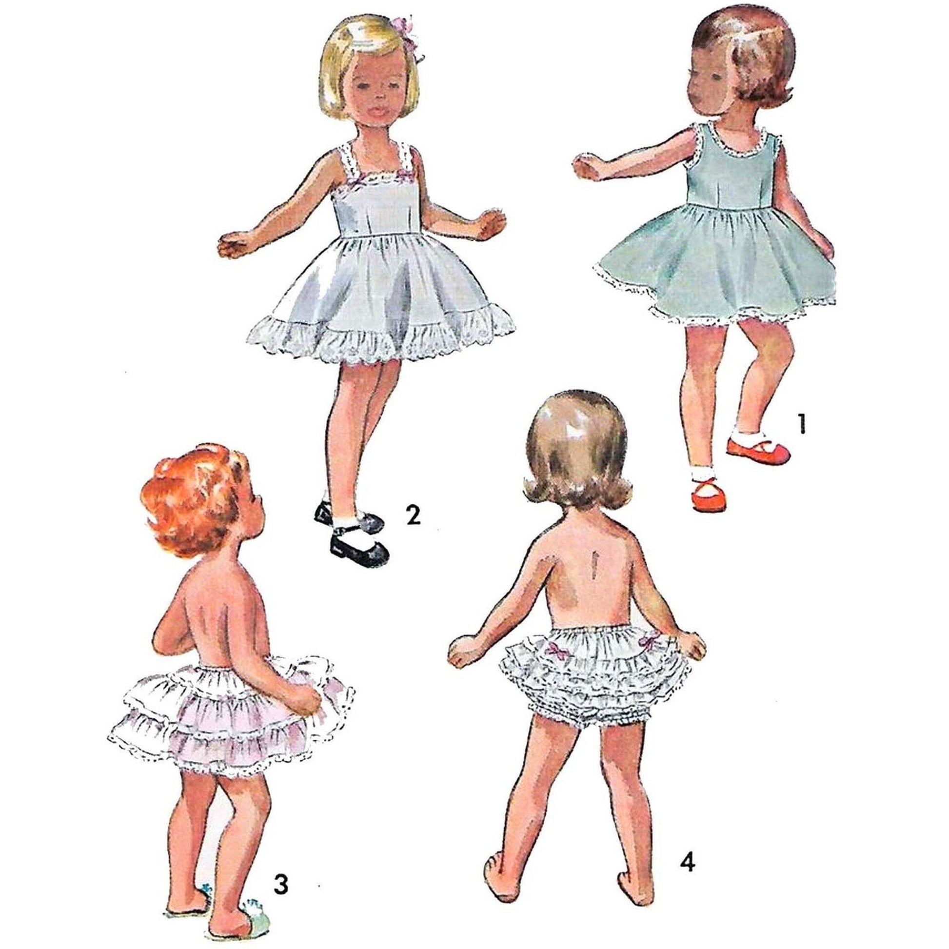 Children wearing slip dresses and petticoats made using sewing pattern Simplicity 3296