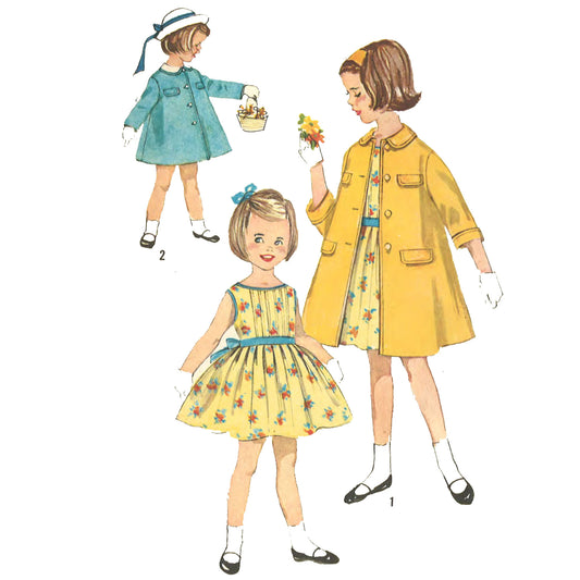 Little girls in dress and coats.