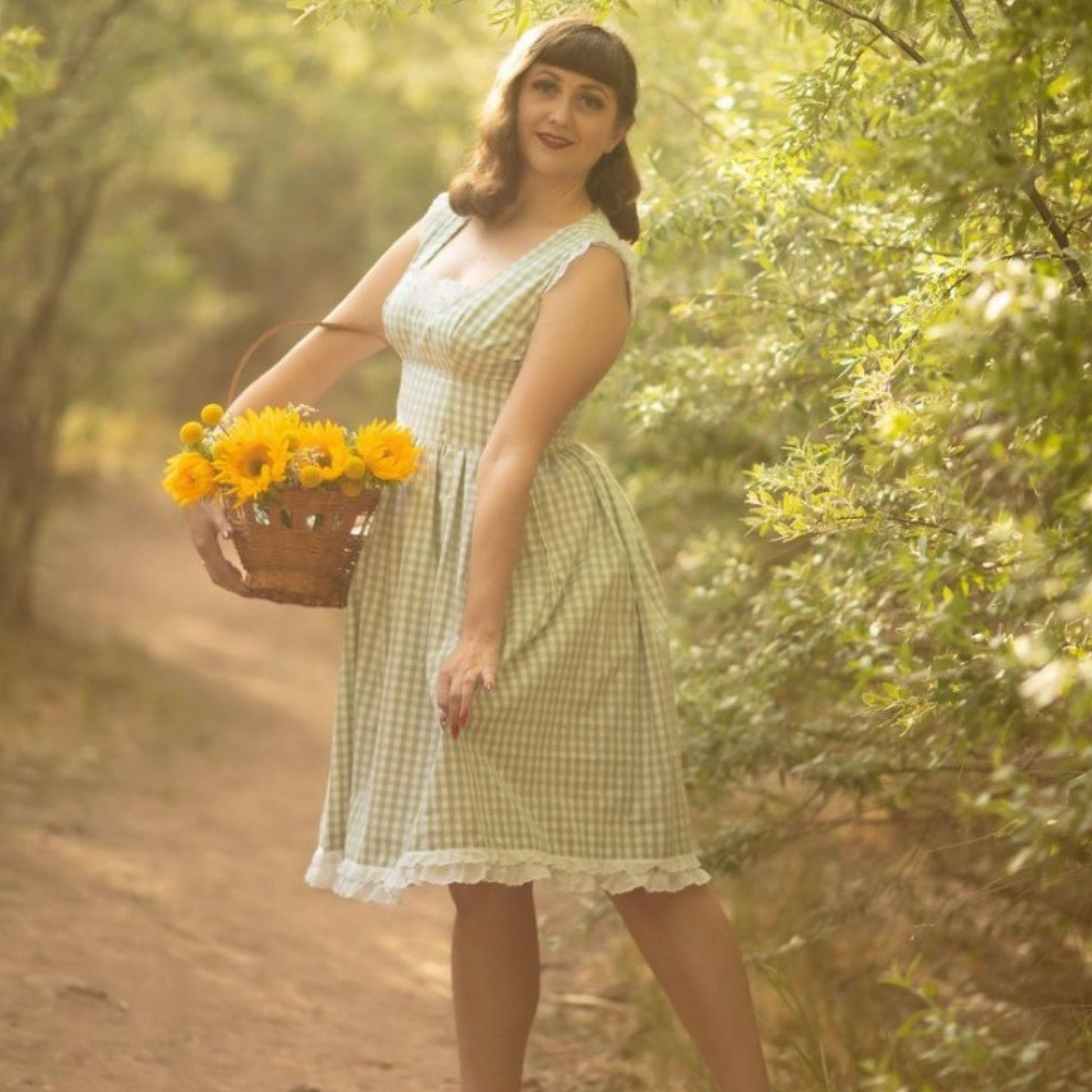 Model wearing 1960s one-piece dress and scarf made from Simplicity 3918 pattern