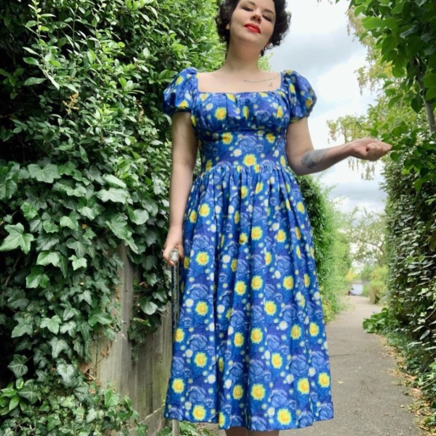 Model wearing 1950s one-piece dress made from Simplicity 4638 pattern