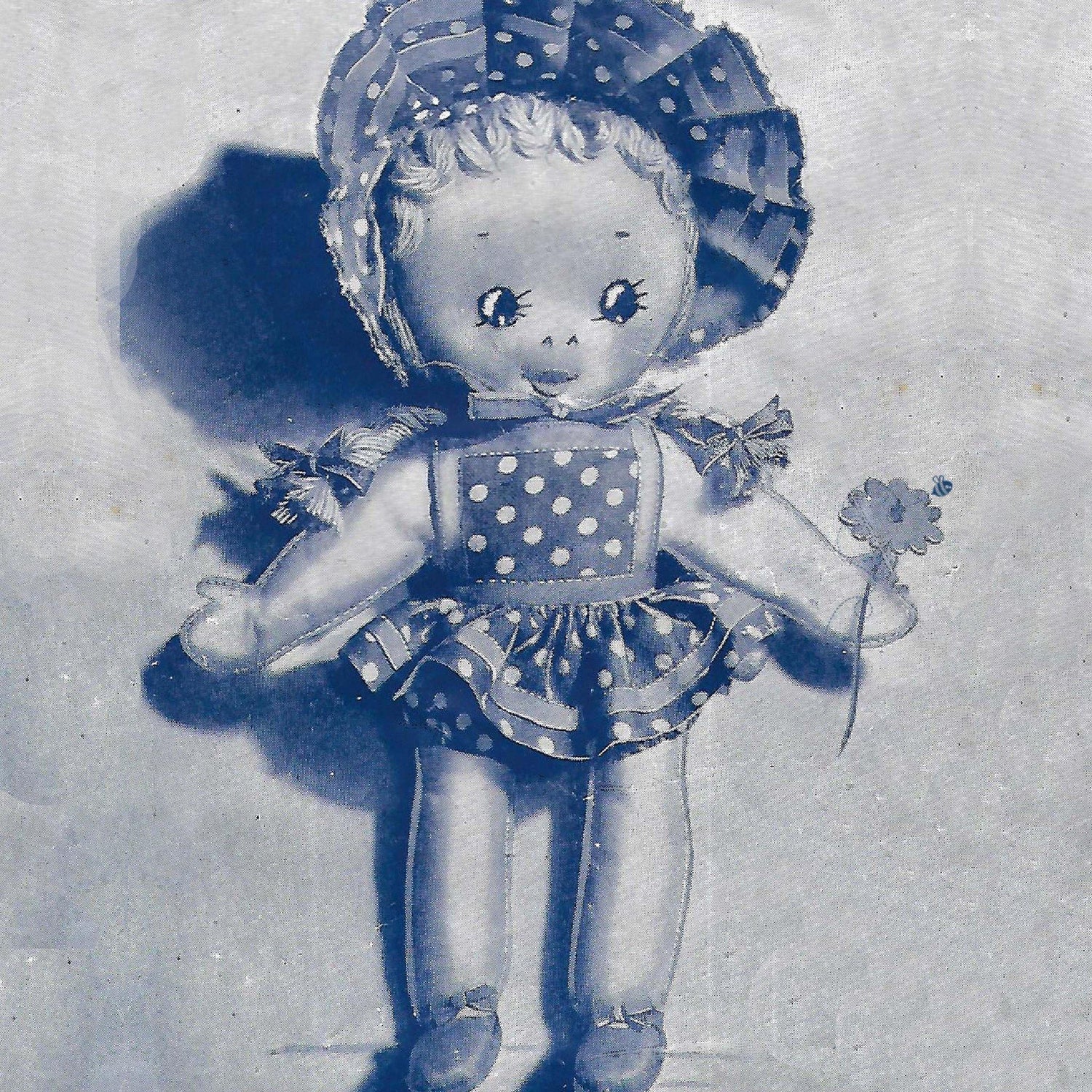 1940s 'Sunny Sue' rag doll, with spotty dress and bonnet.