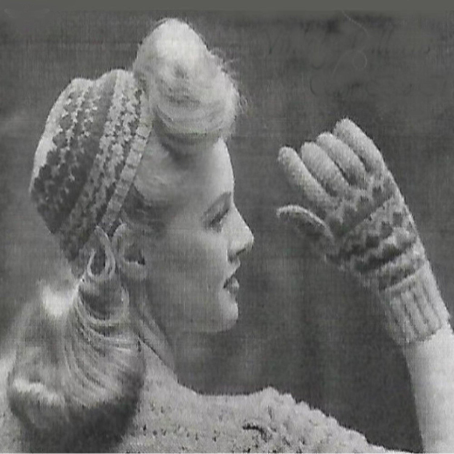 Woman wearing hat and gloves