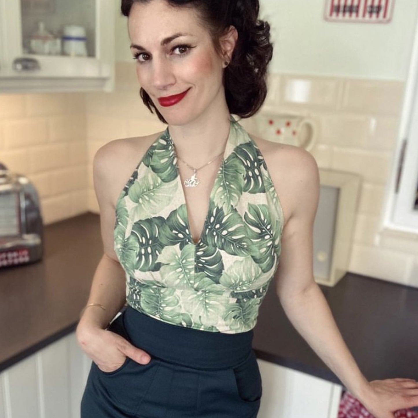 Model wearing 1950s halter-neck blouse made from Butterick 6136 pattern