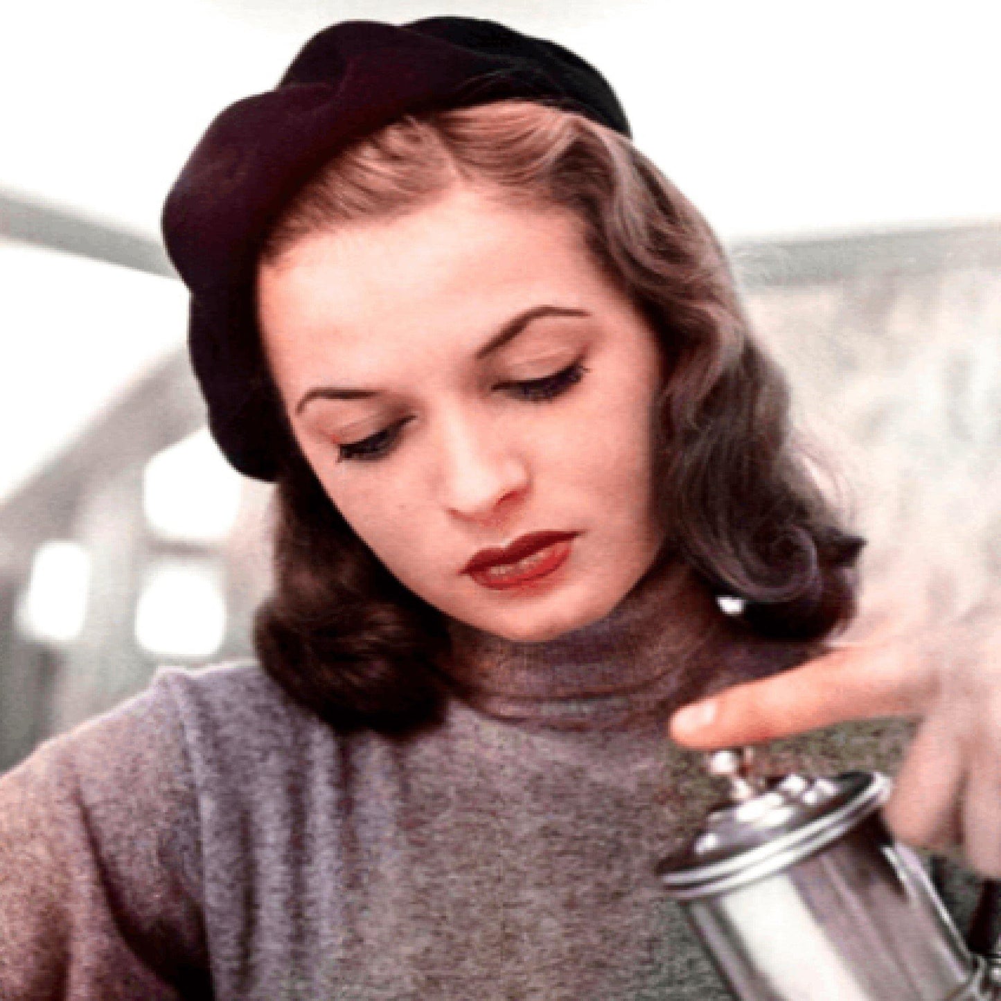 Photograph of a women wearing vintage beret.